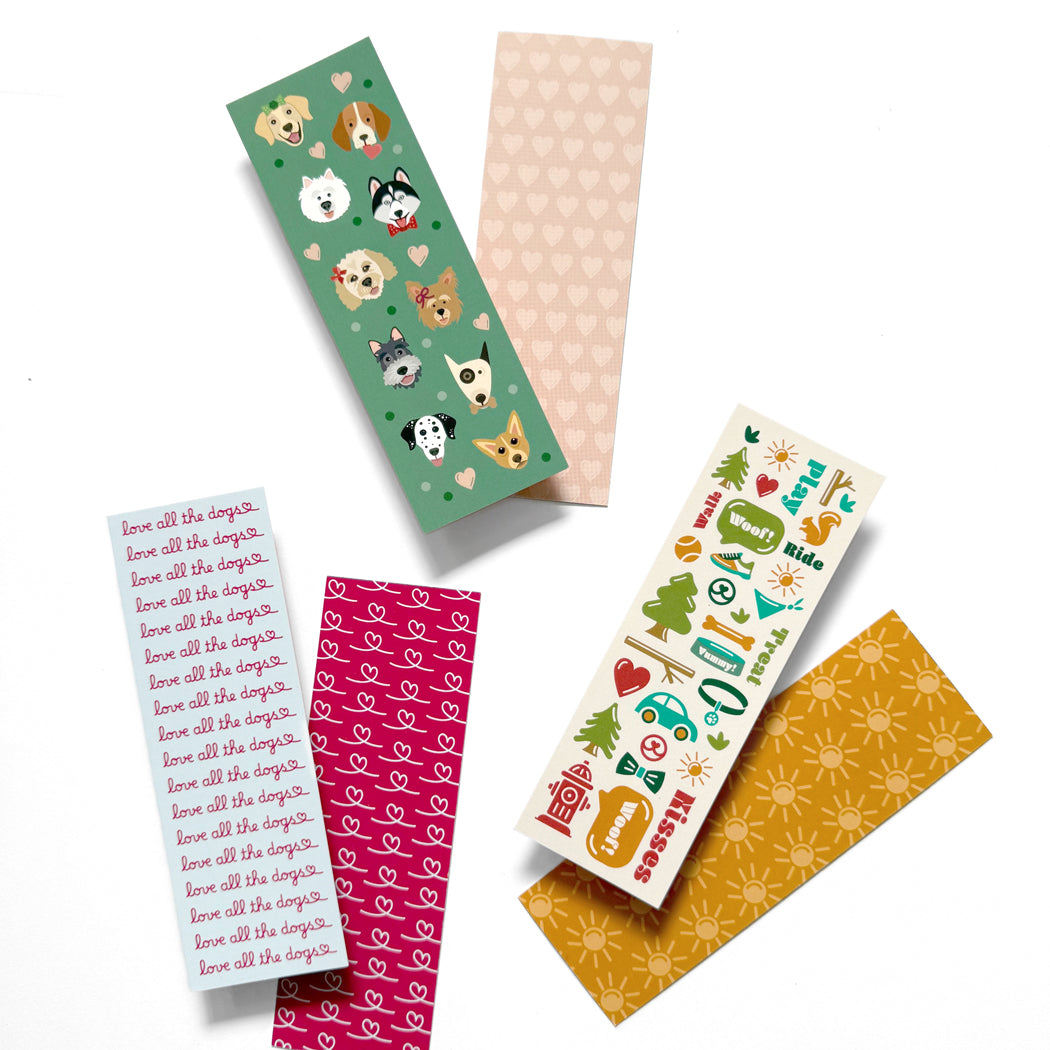 Set of three dog-themed bookmarks with cute illustrations and playful phrases, perfect for dog lovers."