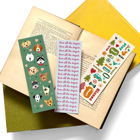 Set of three dog-themed bookmarks with cute illustrations and playful phrases, perfect for dog lovers.