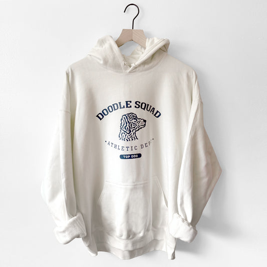 White hoodie with 'Doodle Squad' text and graphic on a white background