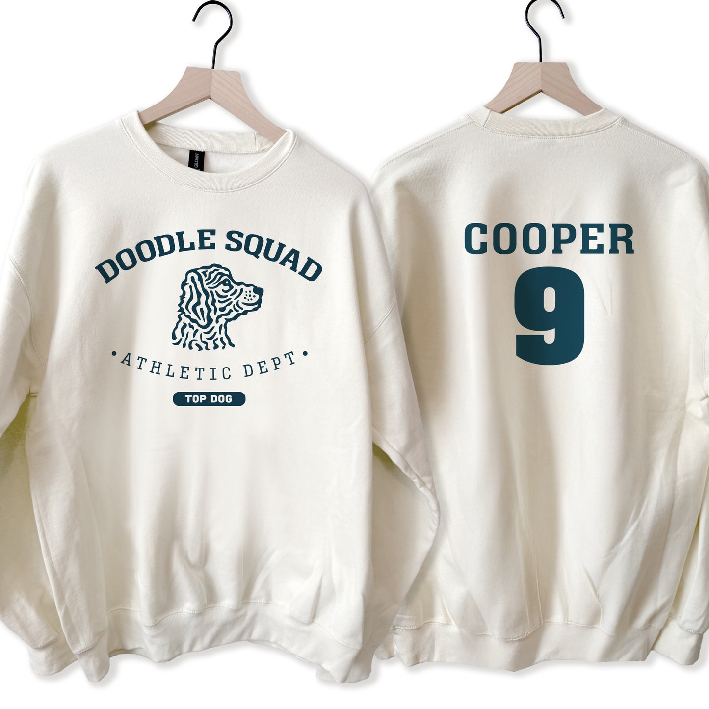 Off white sweatshirt with 'Doodle Squad' and 'Cooper 9' text on a white background