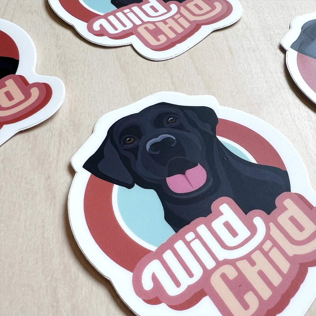 Wild Child Black Lab Dog Sticker – a waterproof vinyl decal featuring an adventurous black Labrador Retriever.