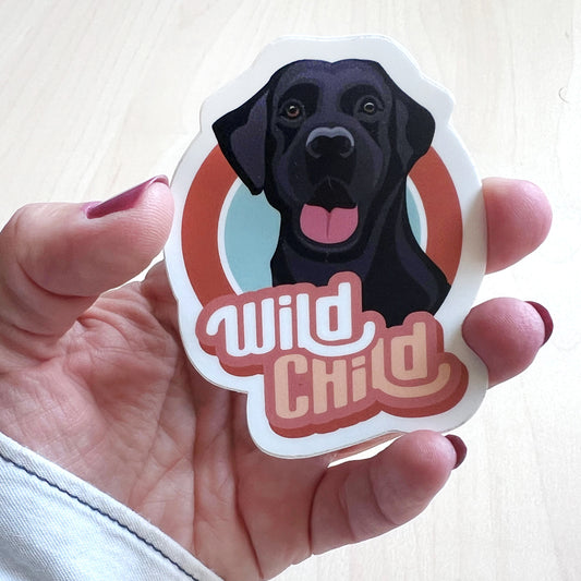 Wild Child Black Lab Dog Sticker – a waterproof vinyl decal featuring an adventurous black Labrador Retriever.