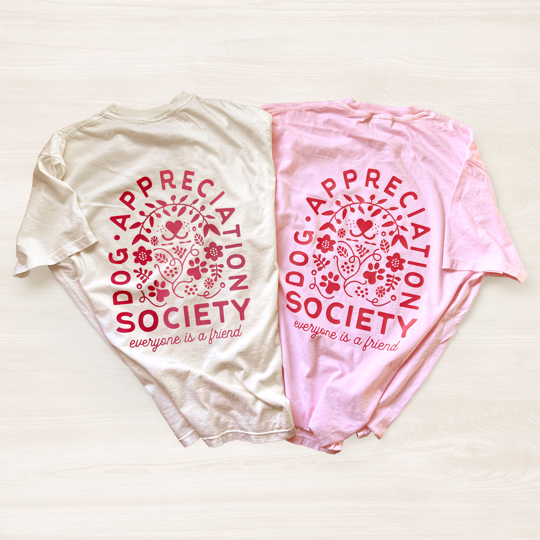 Ivory and pink Dog Appreciation Society Graphic T-Shirt with hand-illustrated design on front and back.