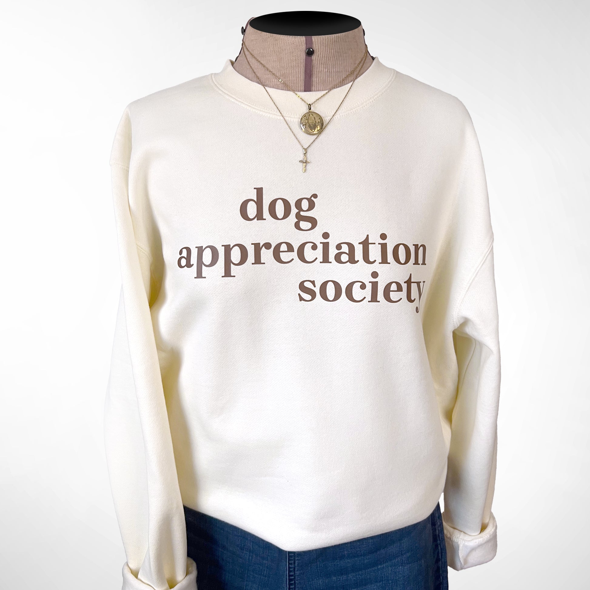 Front view of Dog Appreciation Society Sweatshirt in Bone color with brown typography.