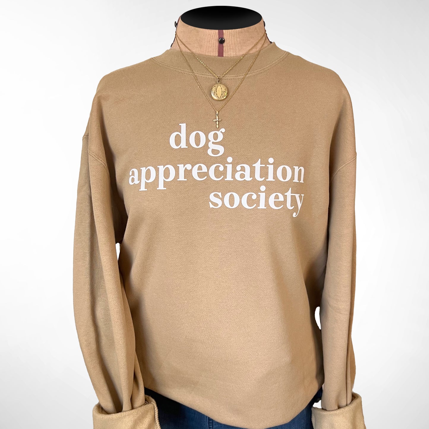 Front view of Dog Appreciation Society Sweatshirt in Sandstone color with white typography.