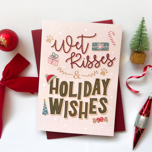 Festive dog Christmas card featuring 'Wet Kisses & Christmas Wishes' message, perfect for pet lovers.