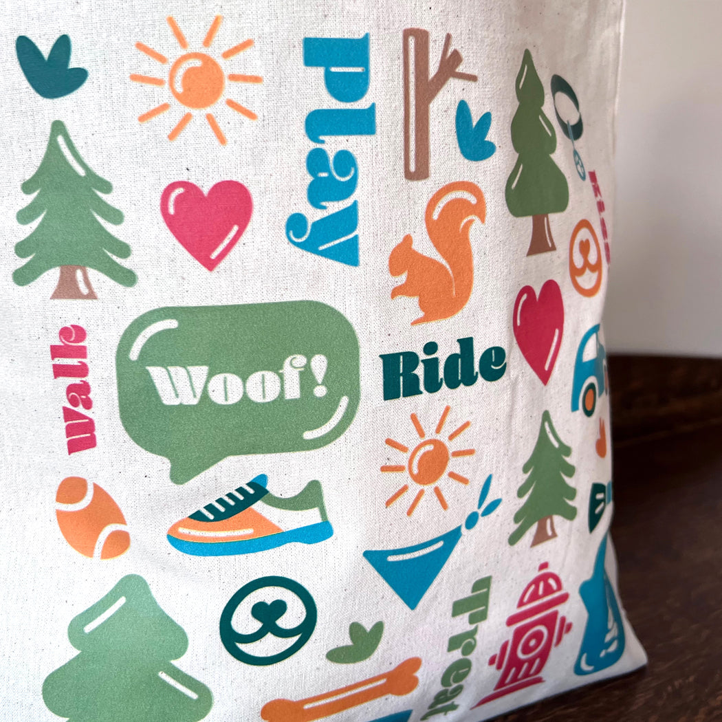 Close-up of Dog Life Tote Bag showcasing durable cotton canvas material and 21.5-inch handles.