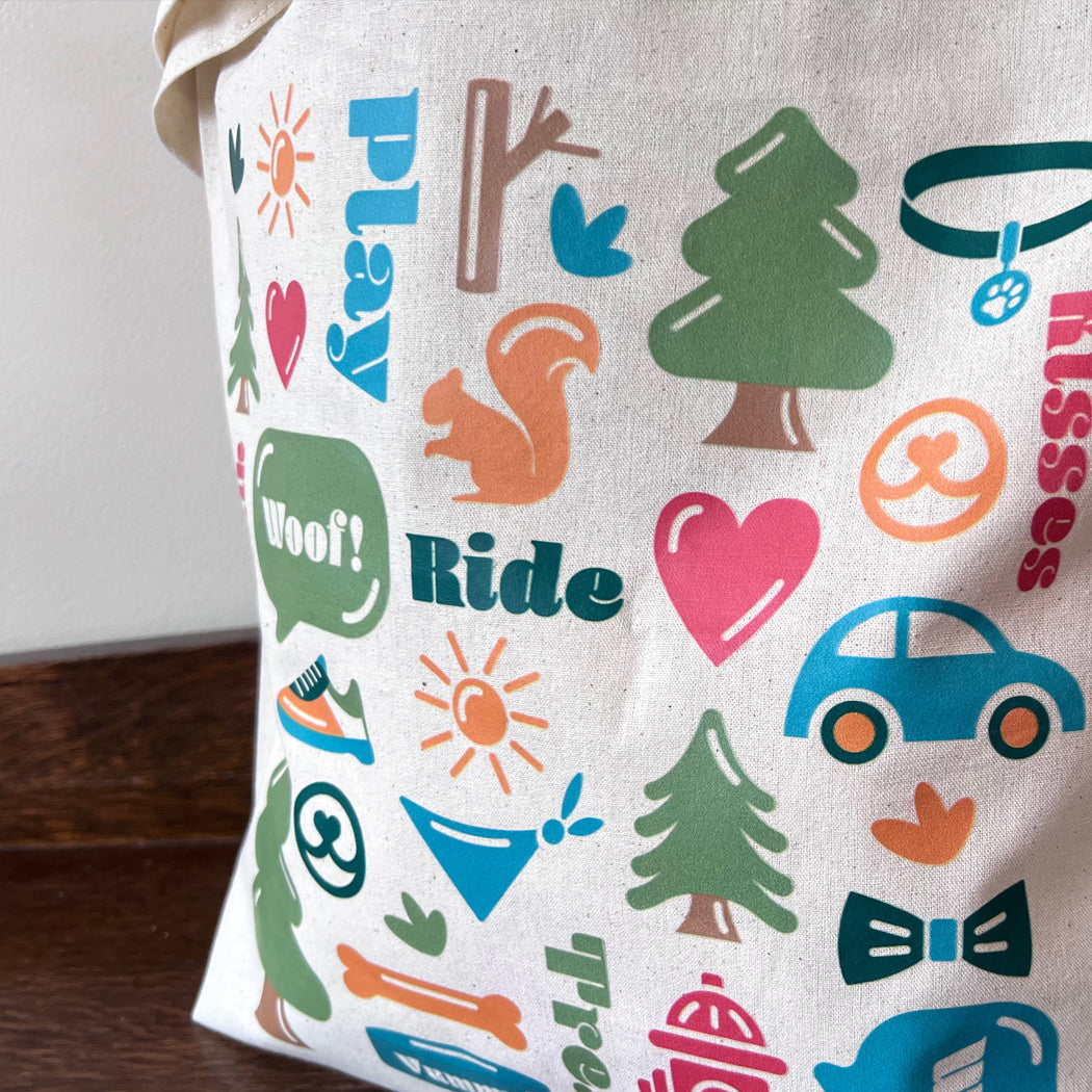 Close-up of Dog Life Tote Bag showcasing durable cotton canvas material and 21.5-inch handles.