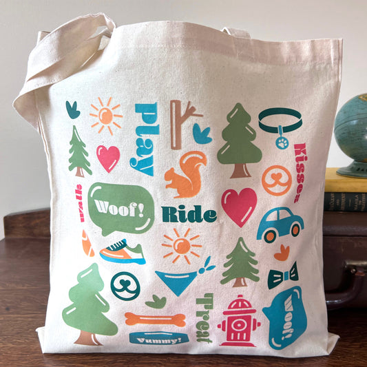 Front view of Dog Life Tote Bag featuring vibrant dog-themed pattern.