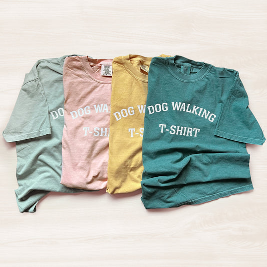Sage green, peach, mustard and emerald color unisex Dog Walking T-Shirt made from 100% ringspun cotton.
