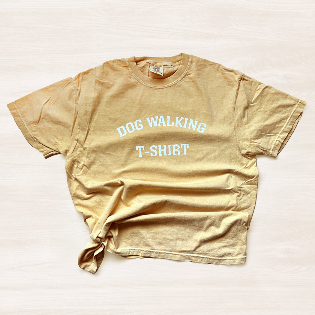 Mustard color unisex Dog Walking T-Shirt made from 100% ringspun cotton.