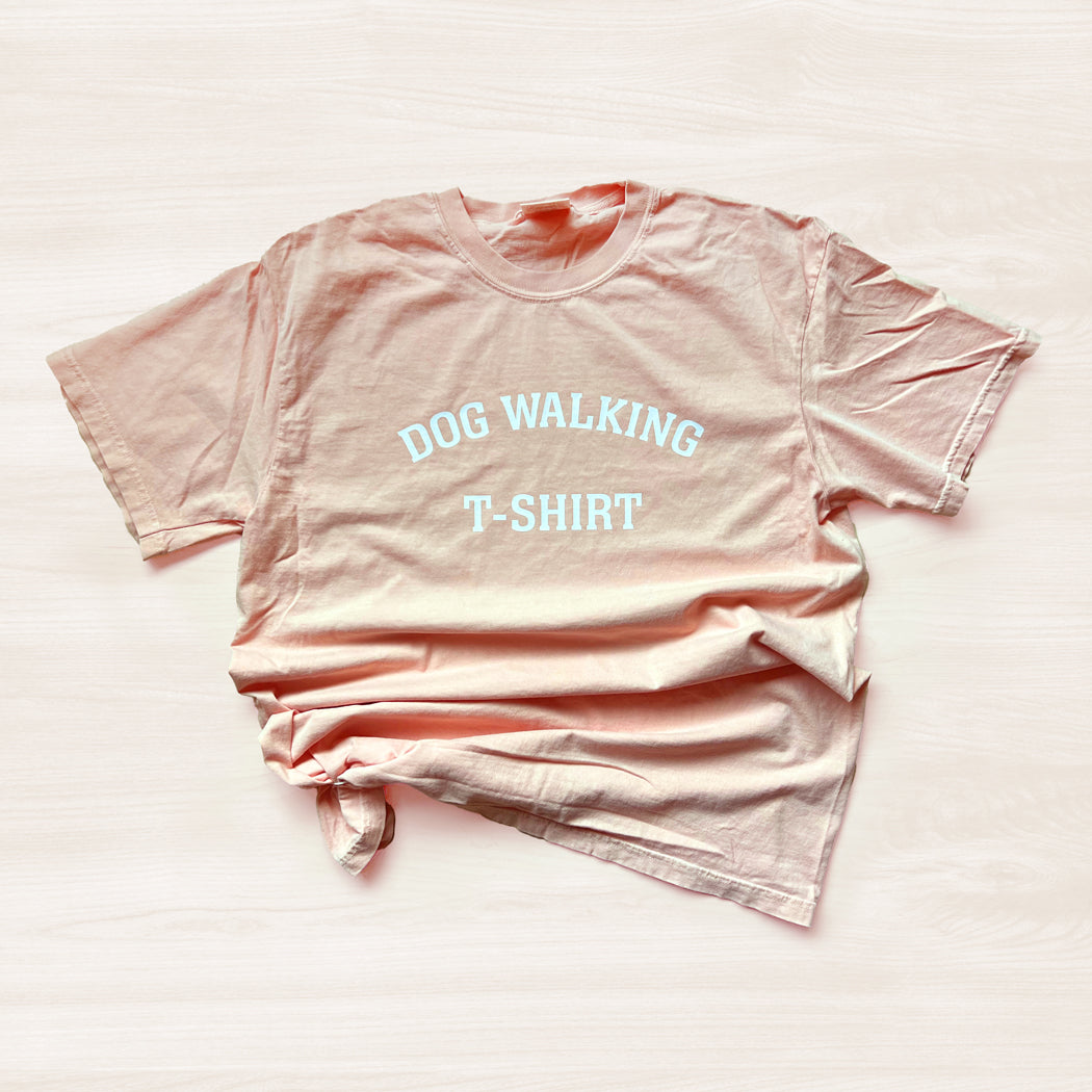 Peachy color Dog Walking T-Shirt showcasing soft and comfortable material.