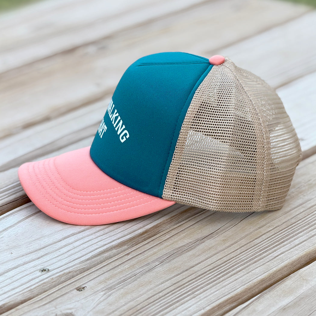 Side view of stylish trucker hat with breathable mesh back and adjustable snapback closure for dog walkers