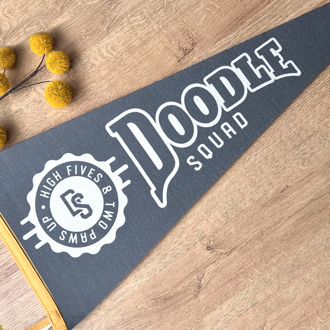 Felt pennant flag with Doodle Squad design, ideal for home, office, or pet events.