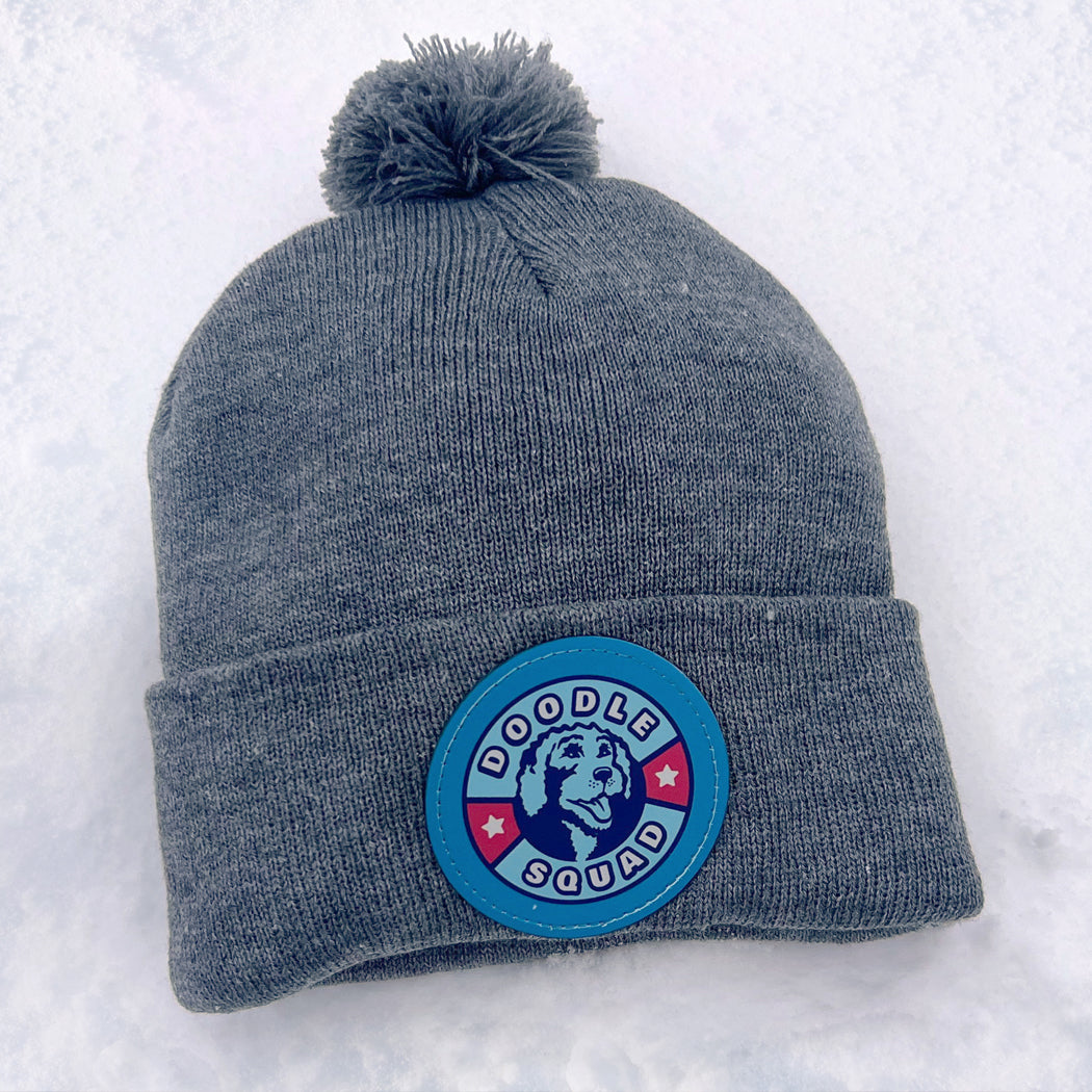 Doodle Squad Pom-Pom Knit Hat – cozy winter beanie for dog lovers.