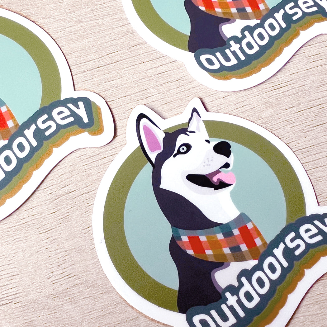 usky Outdoorsy Dog Sticker – waterproof adventure vinyl decal for husky lovers.