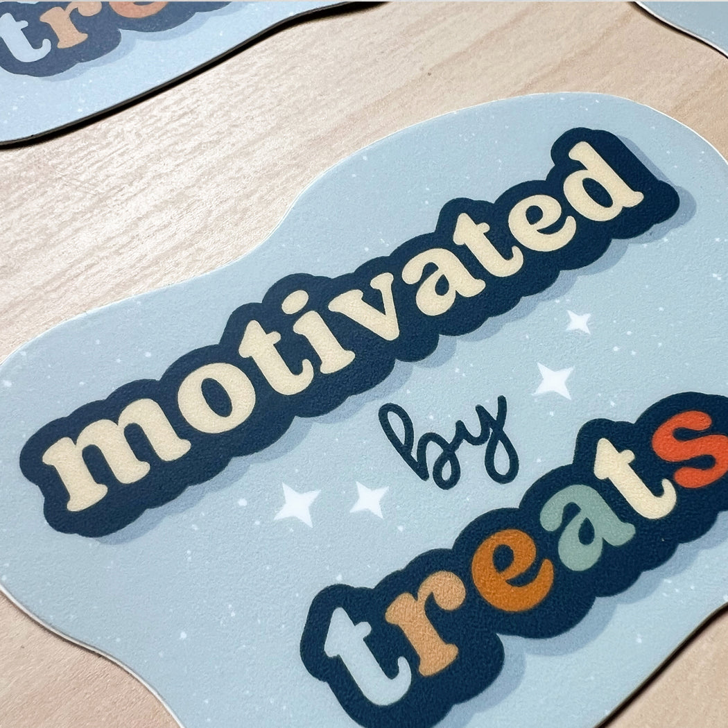 Dog-themed sticker with ‘Motivated by Treats’ text – perfect for laptops, water bottles, and cars.