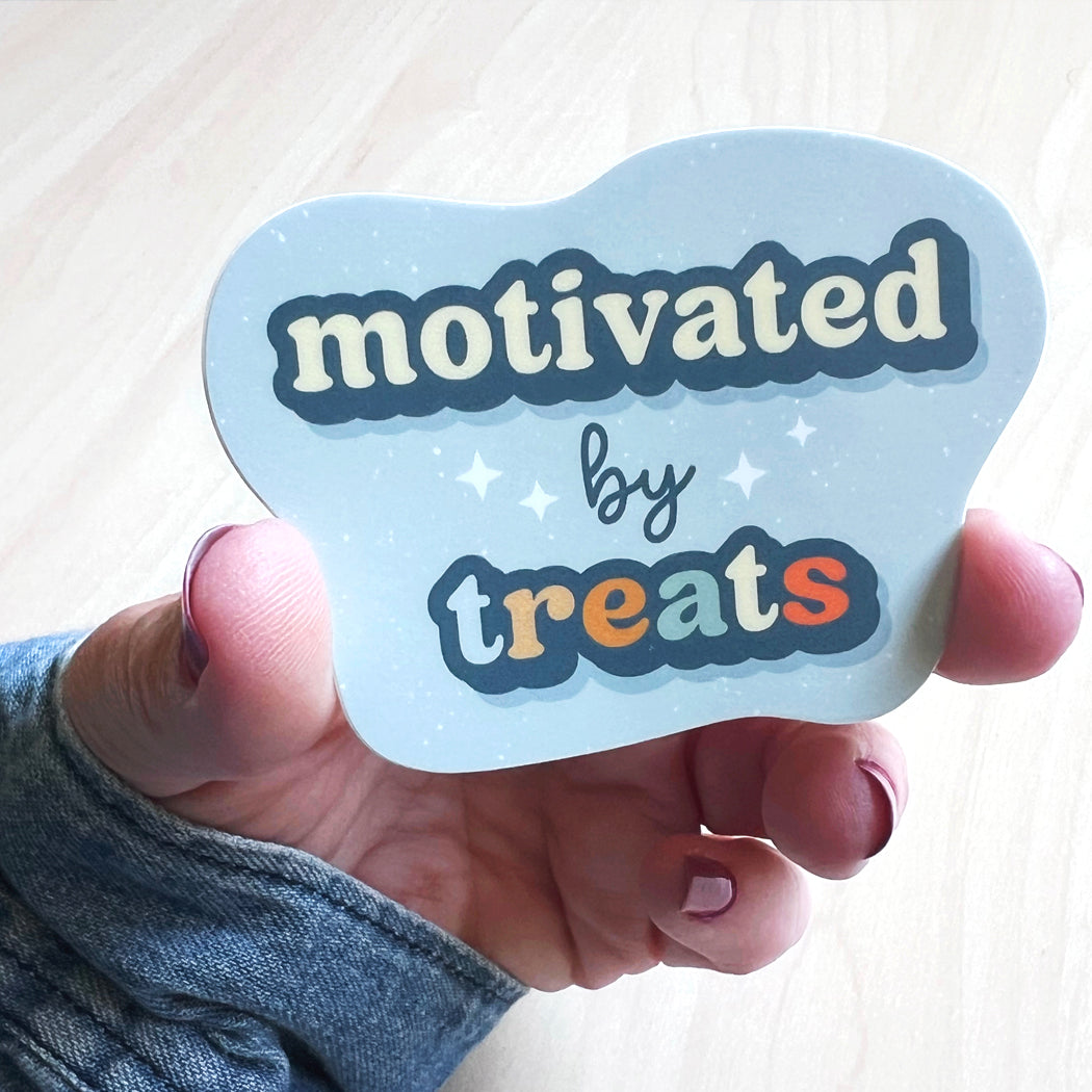 Motivated by Treats dog sticker – funny waterproof vinyl decal for dog lovers.