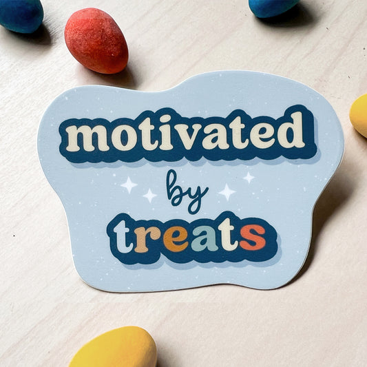 Motivated by Treats dog sticker – funny waterproof vinyl decal for dog lovers.