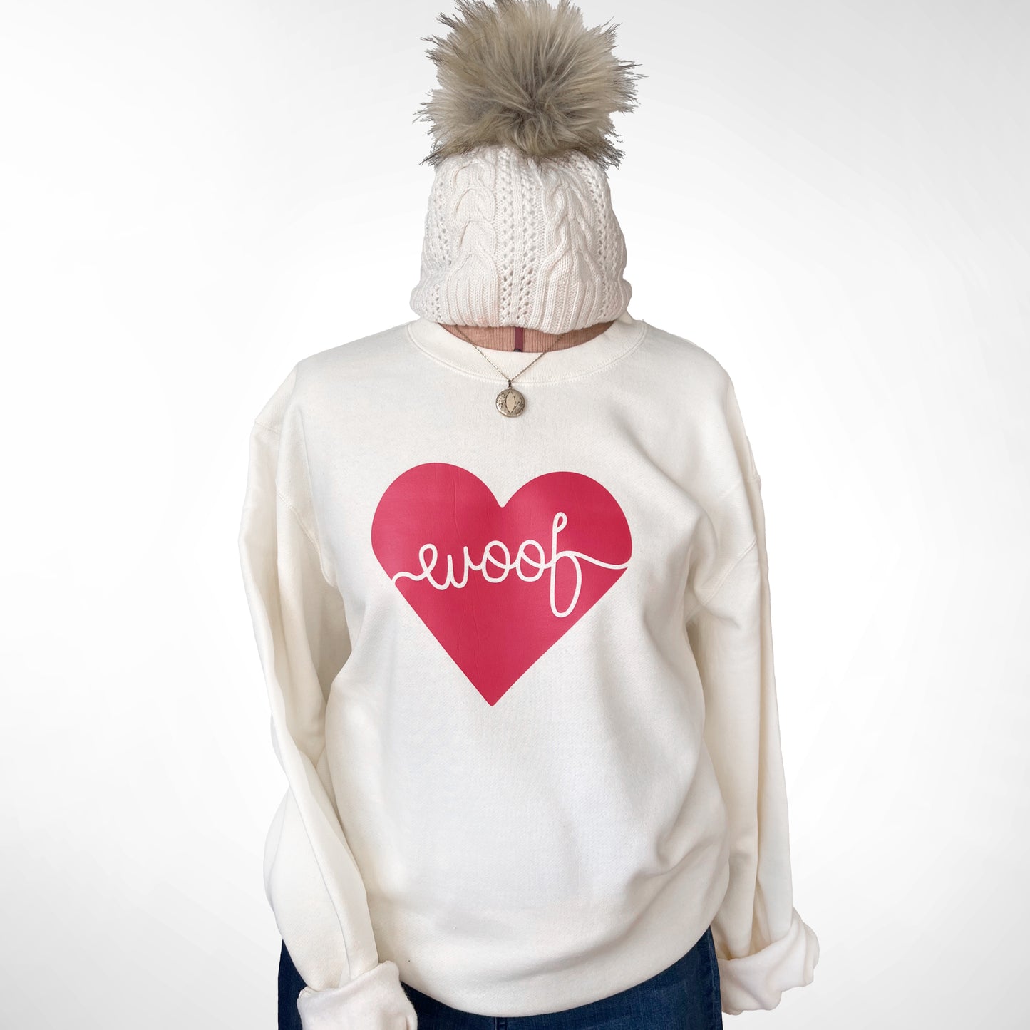 Adorable dog-themed sweatshirt with ‘Woof Heart’ design, a great gift for pet lovers.