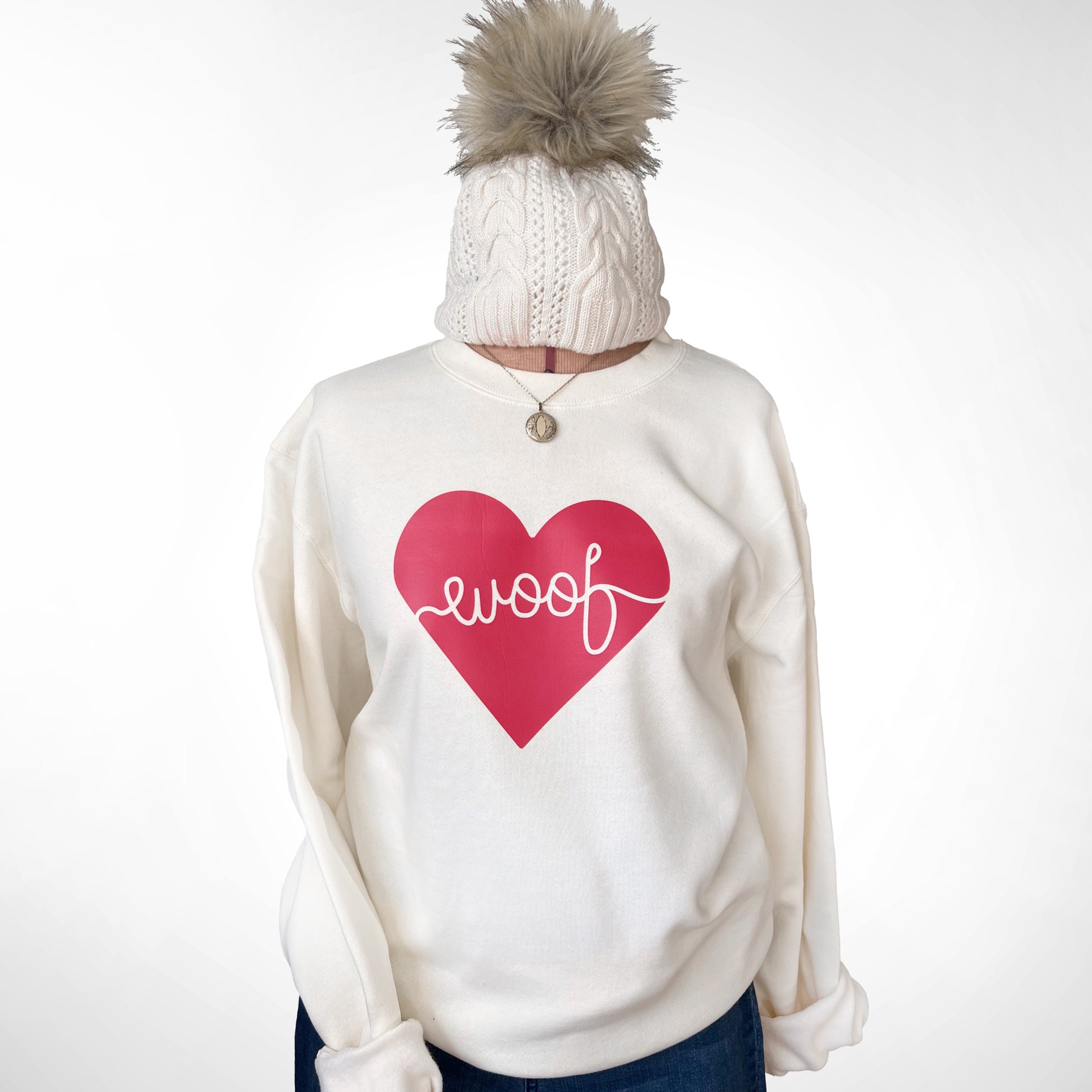 Adorable dog-themed sweatshirt with ‘Woof Heart’ design, a great gift for pet lovers.