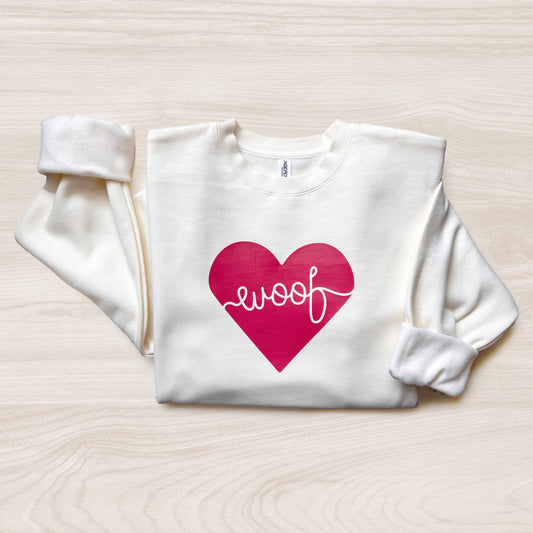 Adorable dog-themed sweatshirt with ‘Woof Heart’ design, a great gift for pet lovers.
