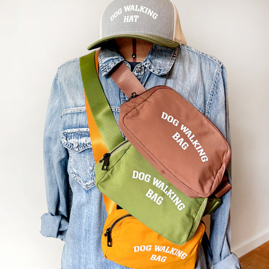 All three colors of the Dog Walking Bag, Brown, Green, and Yellow styled with Dog Walking Hat