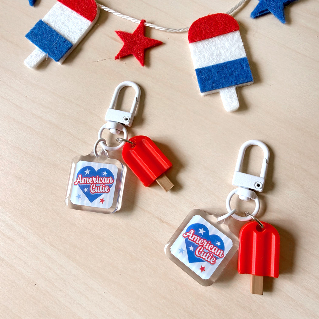 Decorative American Cutie dog collar charm designed for summer adventures.