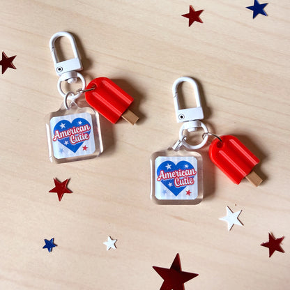Lightweight American Cutie acrylic dog collar charm featuring a summer popsicle.
