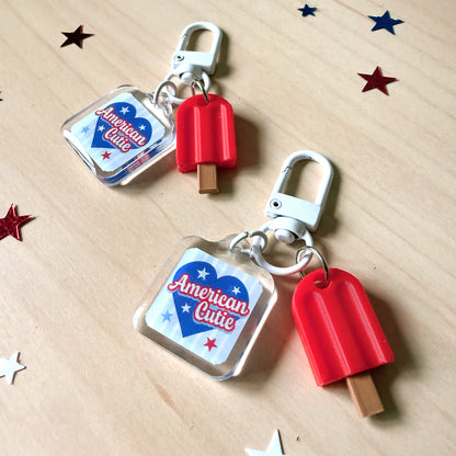American Cutie dog collar charm with red popsicle and coordinating charm attachment.