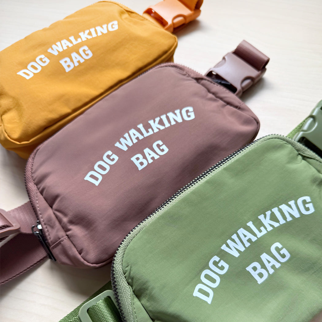 Closeup of all three colors of the Dog Walking Bag – Yellow, Brown, and Green – displayed side by side