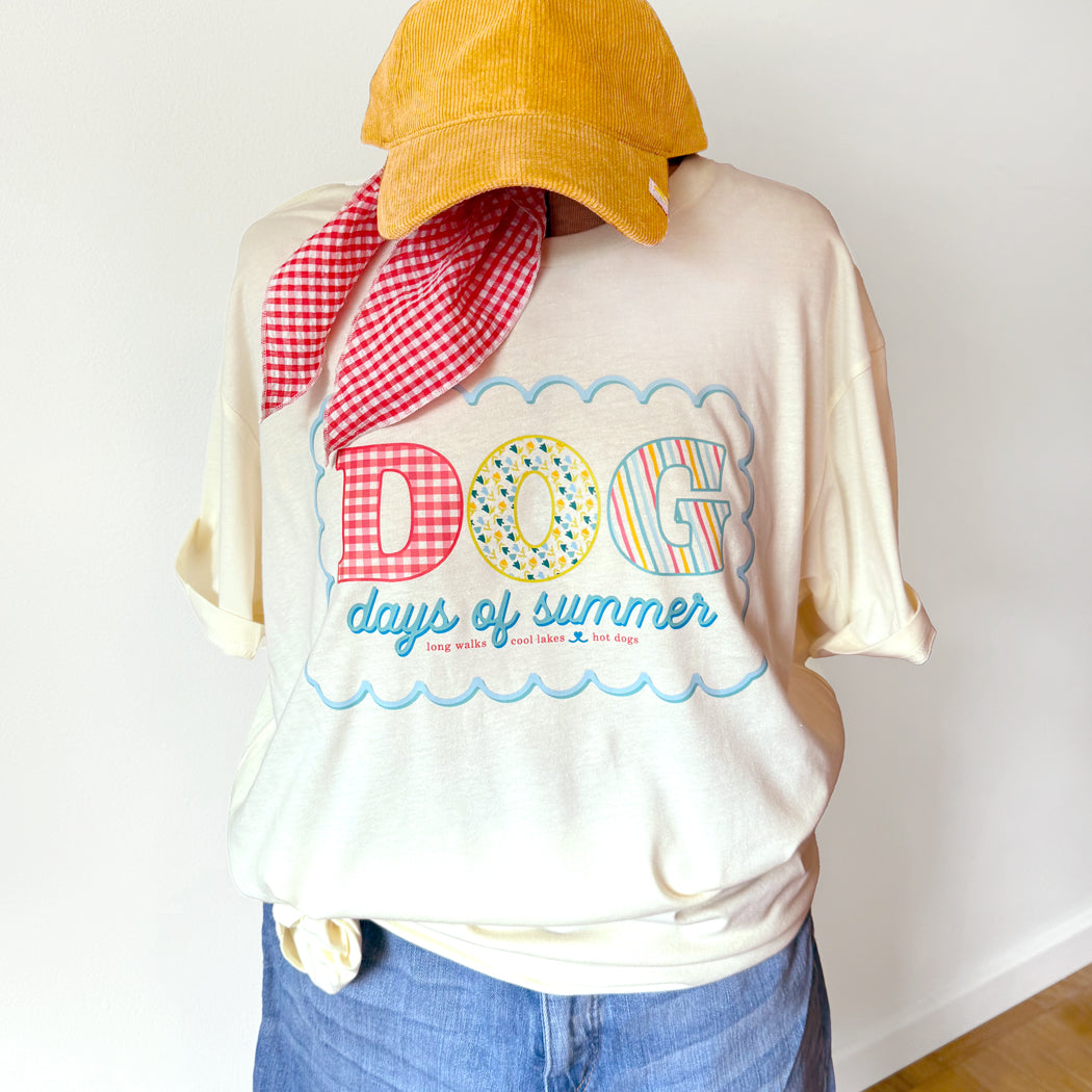 Dog Days of Summer t-shirt with colorful retro lettering and scalloped design – cream tee for dog lovers