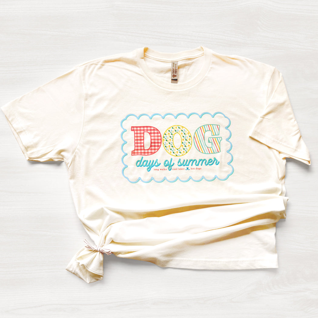 Dog Days of Summer t-shirt with colorful retro lettering and scalloped design – cream tee for dog lovers