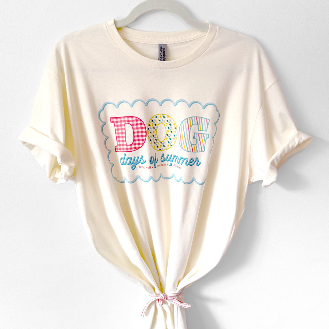 Dog Days of Summer t-shirt with colorful retro lettering and scalloped design – cream tee for dog lovers