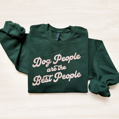 Green sweatshirt with 'Dog People are the Best People' text on a white background