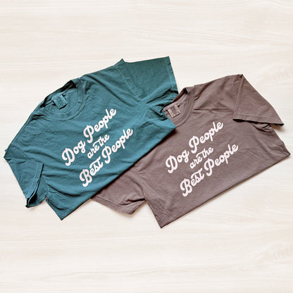 Two t-shirts, one blue and one gray, with 'Dog People are the Best People' text on a light background.