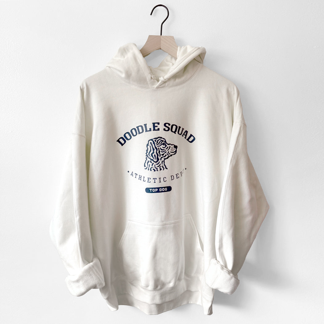 White hoodie with 'Doodle Squad' text and graphic on a white background
