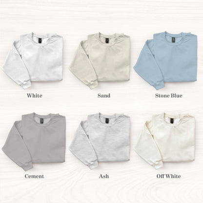 Collection of six sweatshirts in different colors on a white background