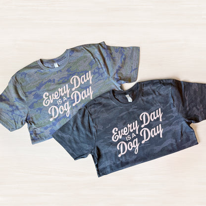 Two t-shirts with 'Every Day is a Dog Day' text on a light background