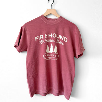 Red t-shirt with 'Fir & Hound Christmas Trees' print on a white background
