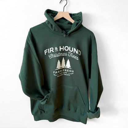 Green hoodie with white text Fir & Hound text.