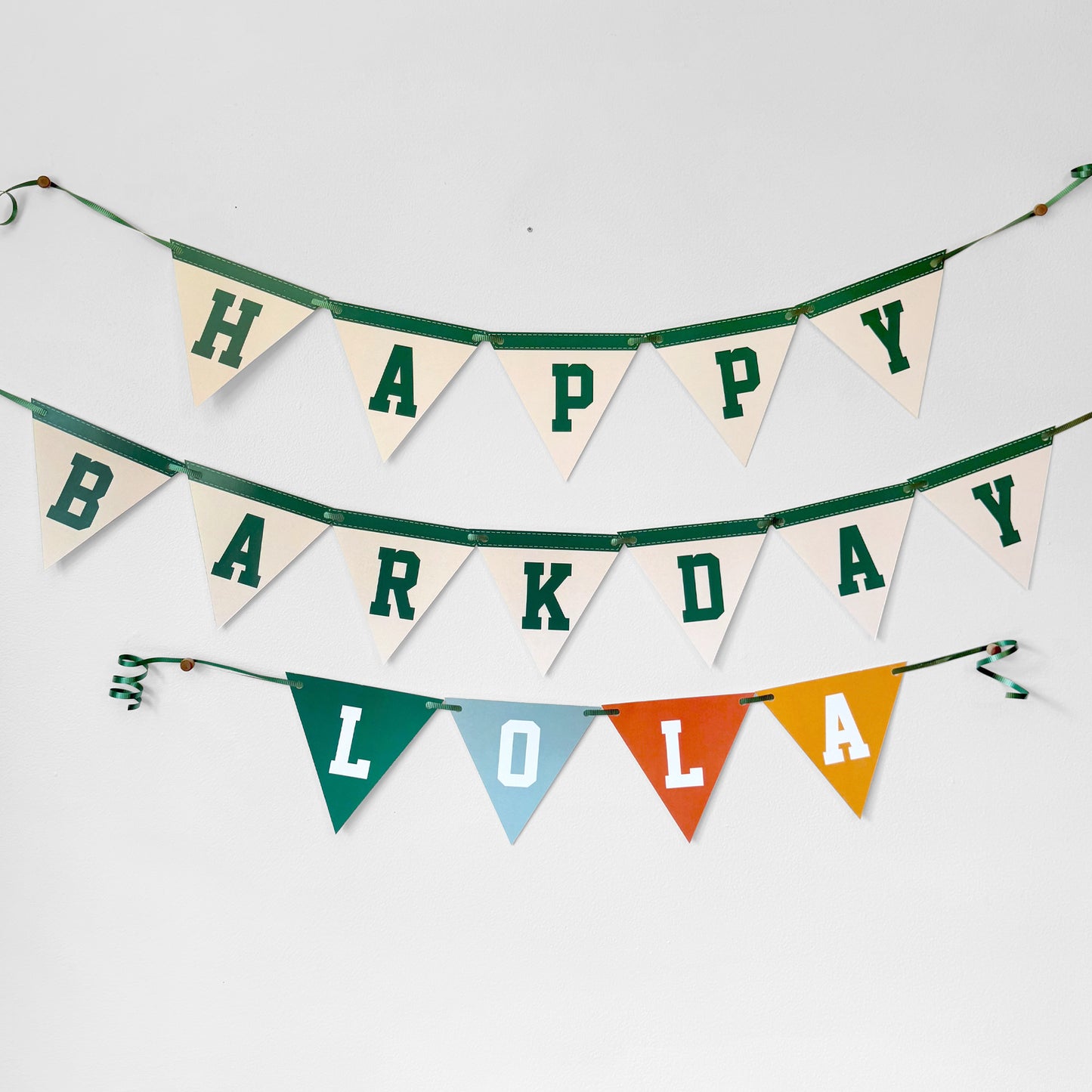 Bunting banner with 'Happy Barkday Lola' on a white background