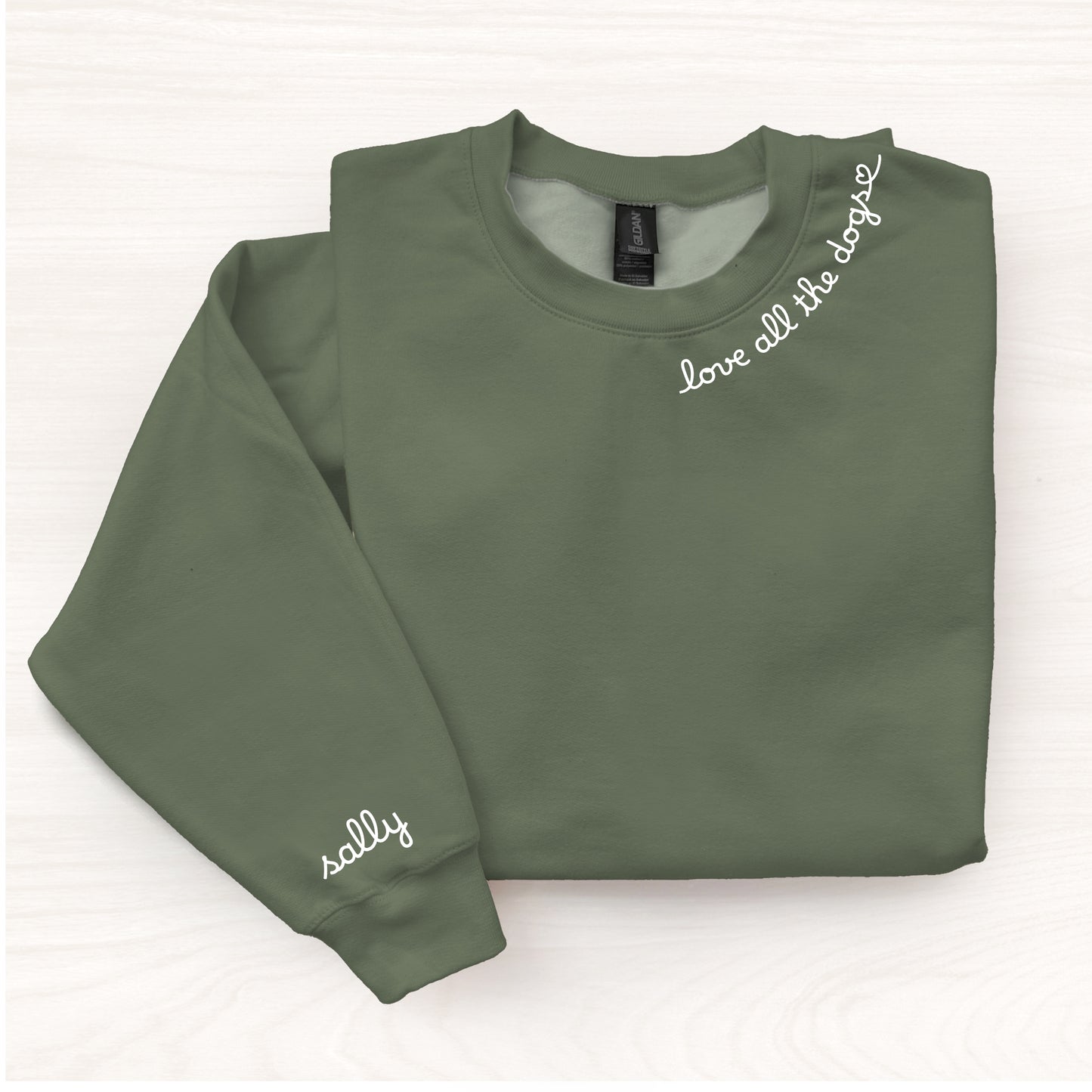 Green sweatshirt with white text on a white background