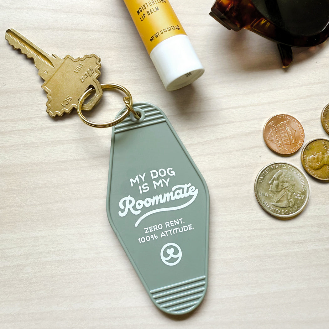 Funny dog lover gift keychain reading My Dog Is My Roommate Zero Rent 100% Attitude
