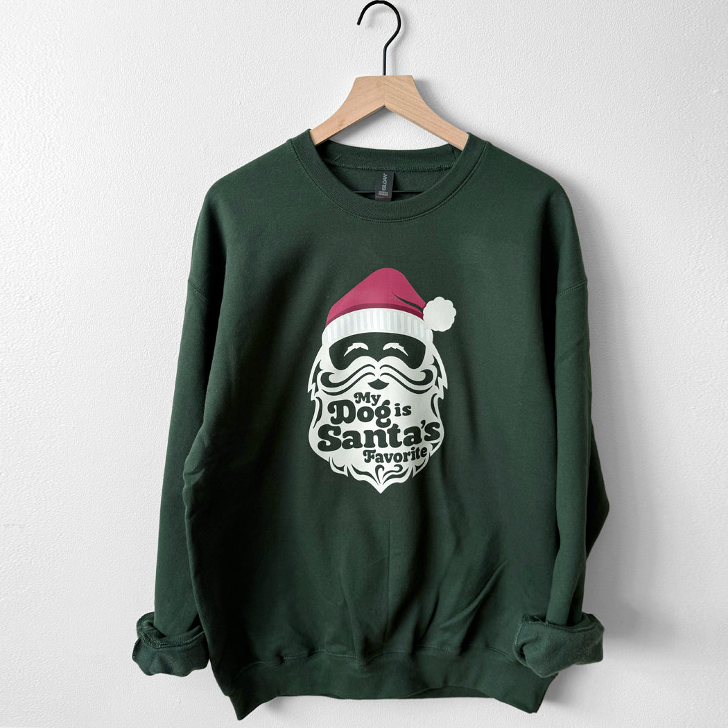 Green sweatshirt with Santa Claus graphic and text on a white background