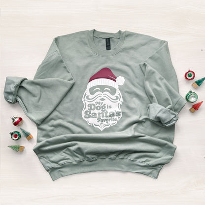 Light green sweatshirt with Santa graphic and text on a white background