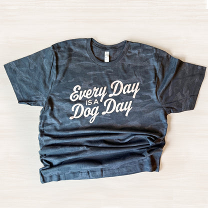 Blue t-shirt with 'Every Day is a Dog Day' text on a white background