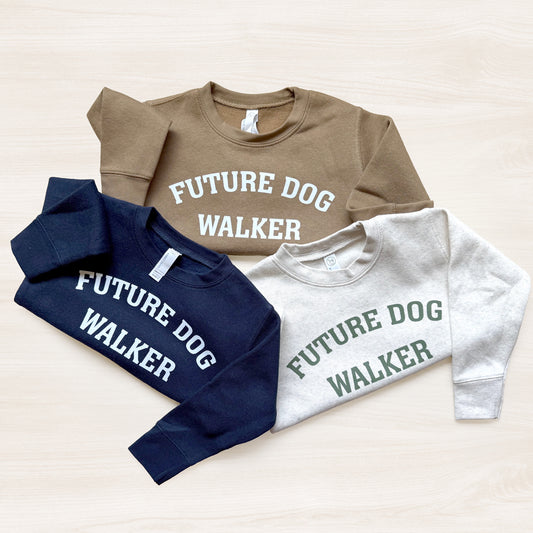 Three sweatshirts with 'Future Dog Walker' text on a light background