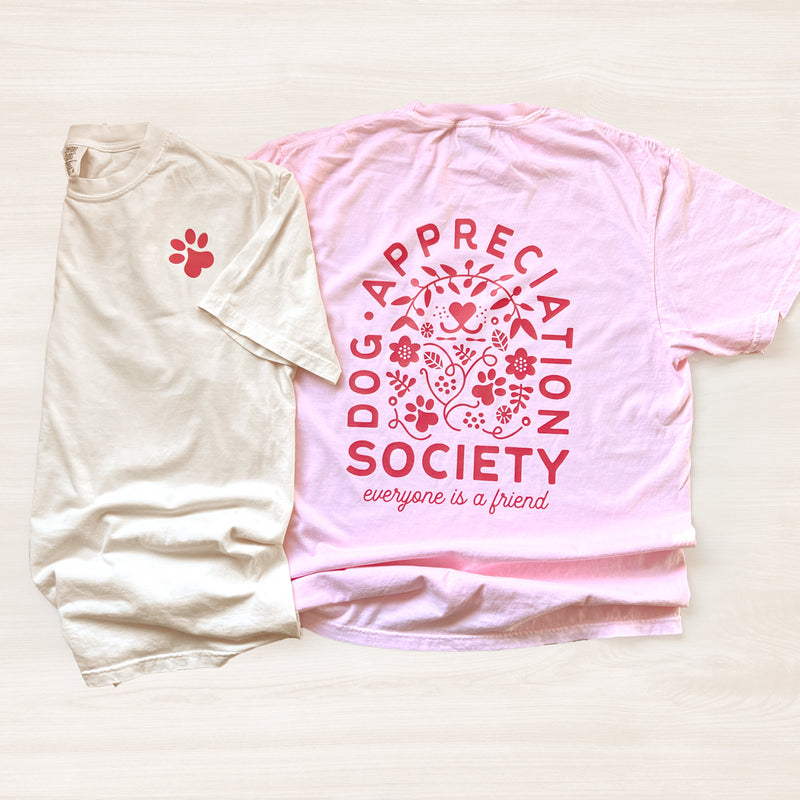 Ivory and pink Dog Appreciation Society Graphic T-Shirt with hand-illustrated design on front and back.