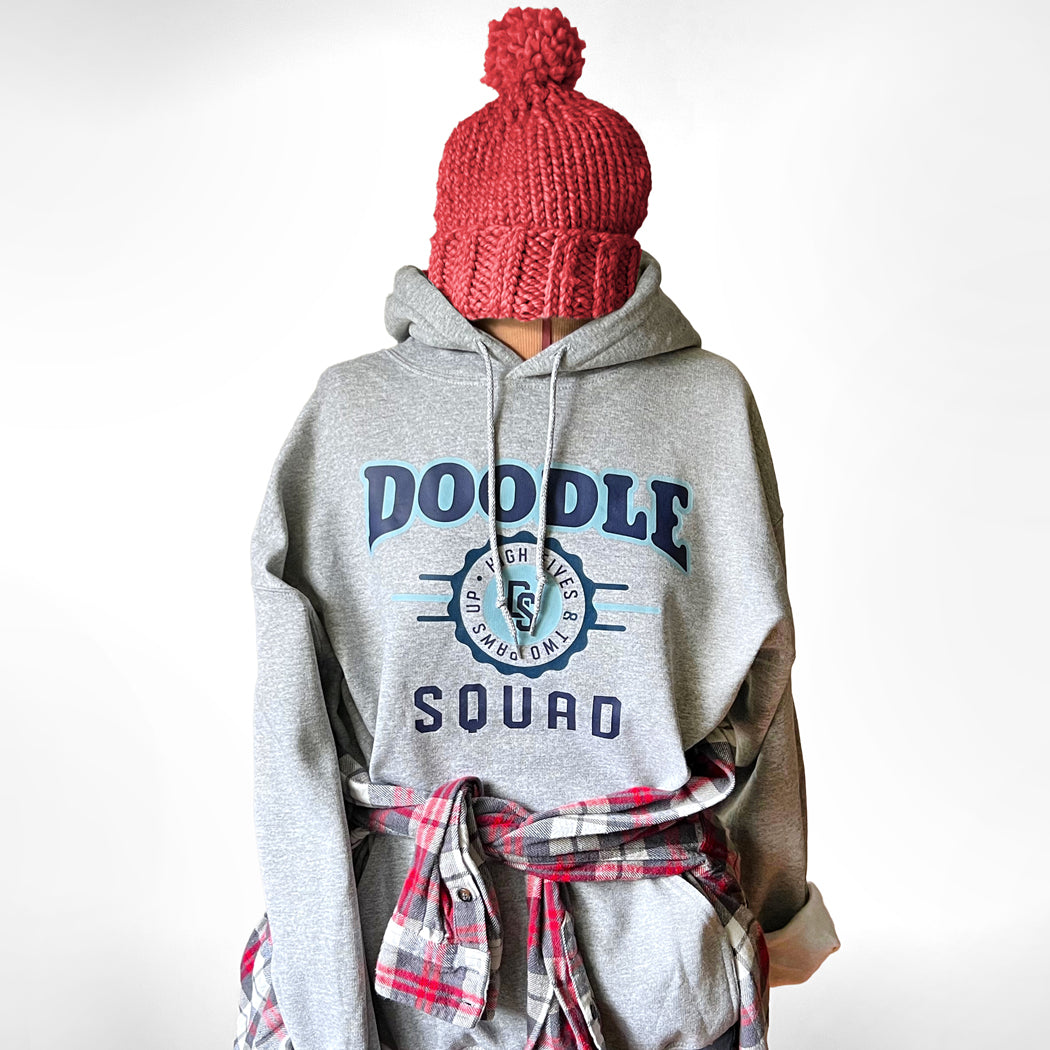 Soft fleece-lined hoodie with an athletic-style doodle dog design.
